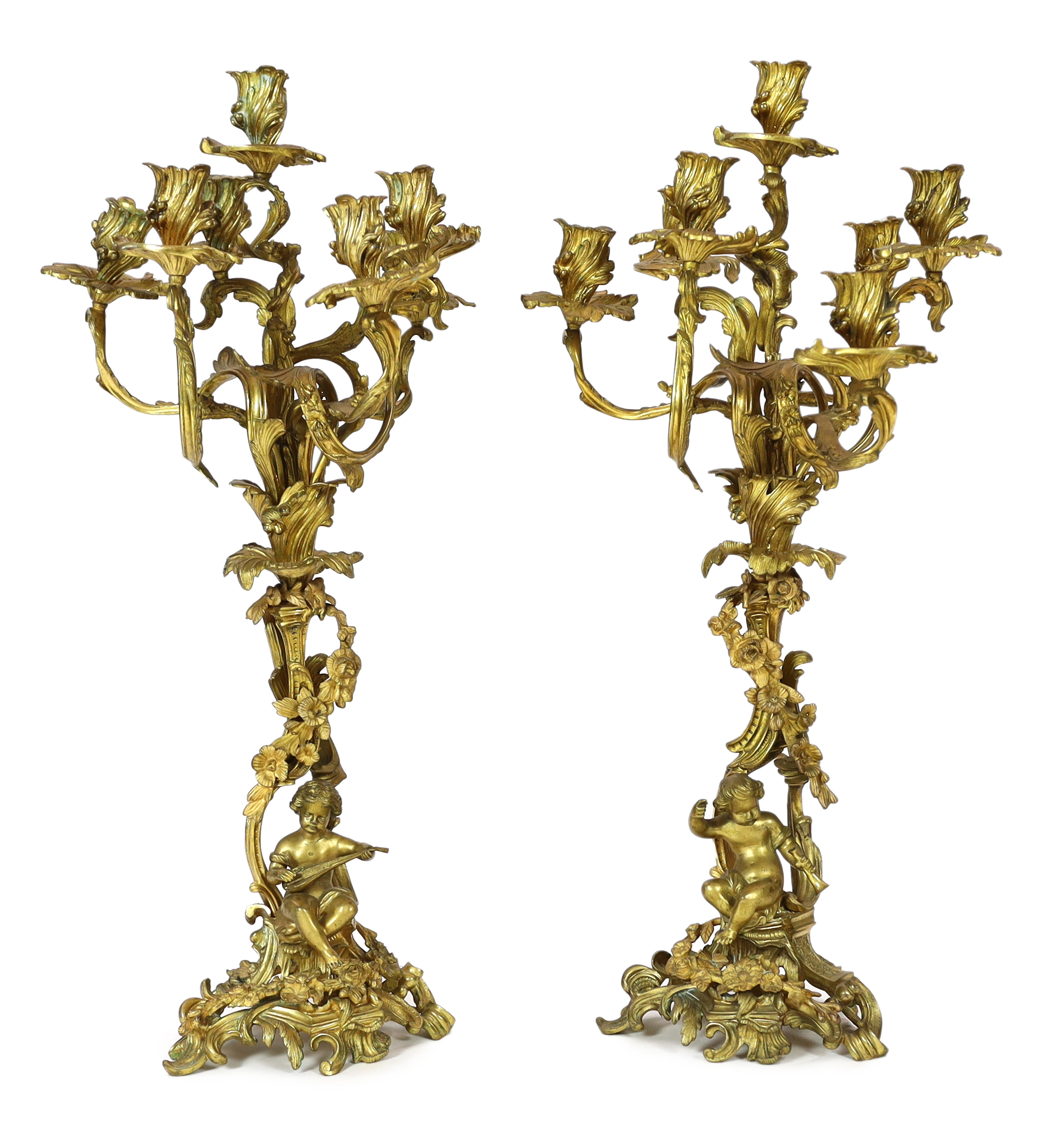 A pair of late 19th century French Louis XVI style ormolu seven light candelabra, 74cm high